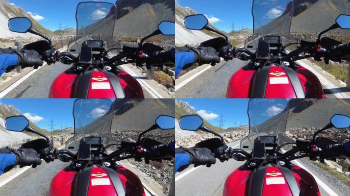 POV骑自行车的人在瑞士阿尔卑斯山风景秀丽的山口骑摩托车，摩托之旅