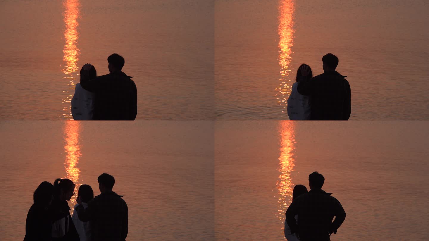 傍晚时分海边欣赏夕阳美景的情侣3