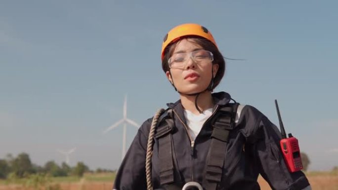 风电场穿着防护服的亚洲女工程师