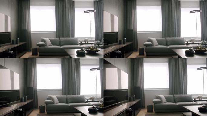 当代客厅。现代灰色沙发和窗帘。极简主义灯