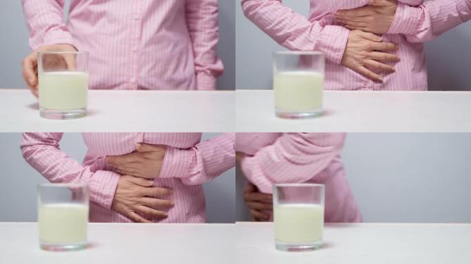 乳糖不耐受概念。喝牛奶后腹部疼痛。