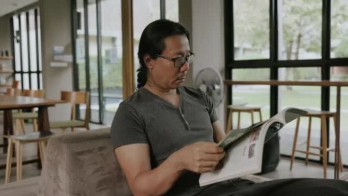 泰国建筑师在bookclub寻找杂志阅读创意