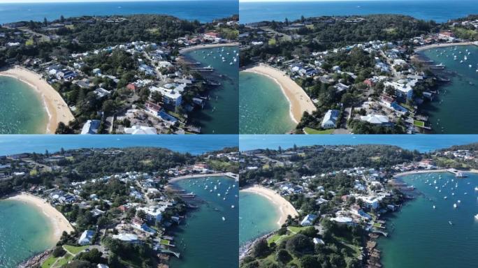 新南威尔士州东悉尼屈臣氏湾Lady Bay海滩的空中无人机回撤视图