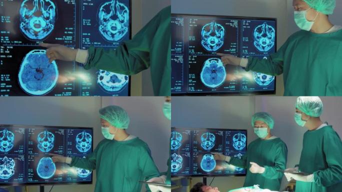 外科医生团队在计算机监视器上学习检查人体内部器官以在现代医院进行手术。