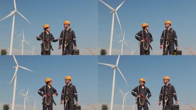 两名工程师检查风力涡轮机