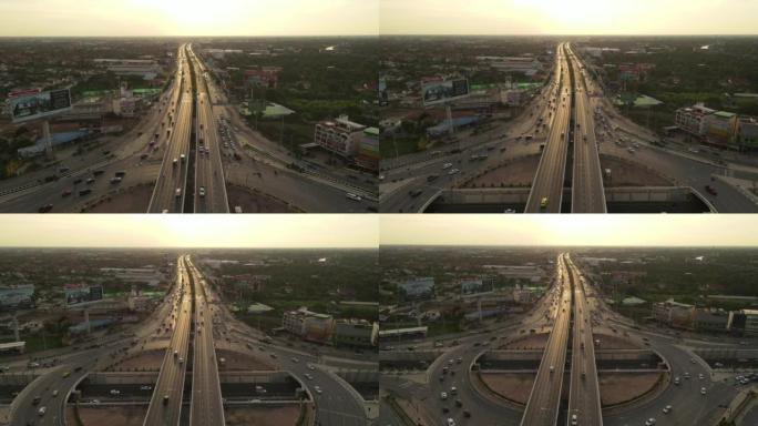 城市中的高速公路路口，鸟瞰图，高角度视图，日落时曼谷的圆圈
