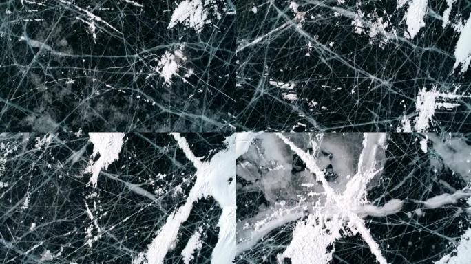 空中上方是蓝色透明的透明冰，里面有裂缝和气泡。冰冻的贝加尔湖。自然地标。冬季景观。受欢迎的旅游目的地