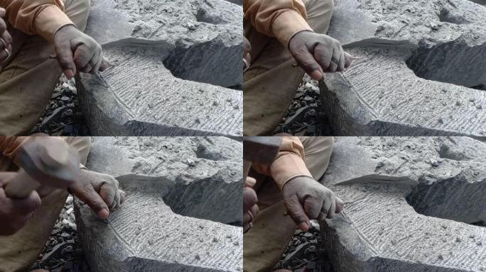 印度石雕艺术家用黑色花岗岩雕刻一个美丽的抽象雕塑，