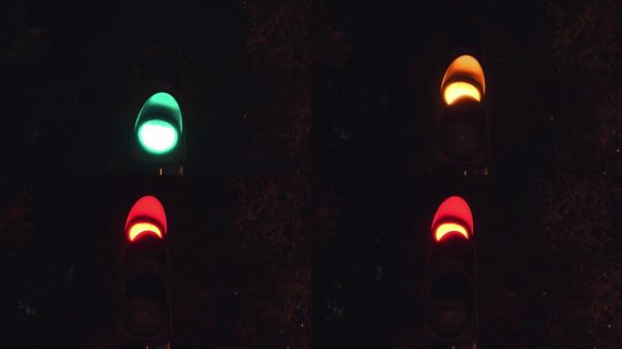 城市中的红色、黄绿色现代交通信号灯。变色交通灯