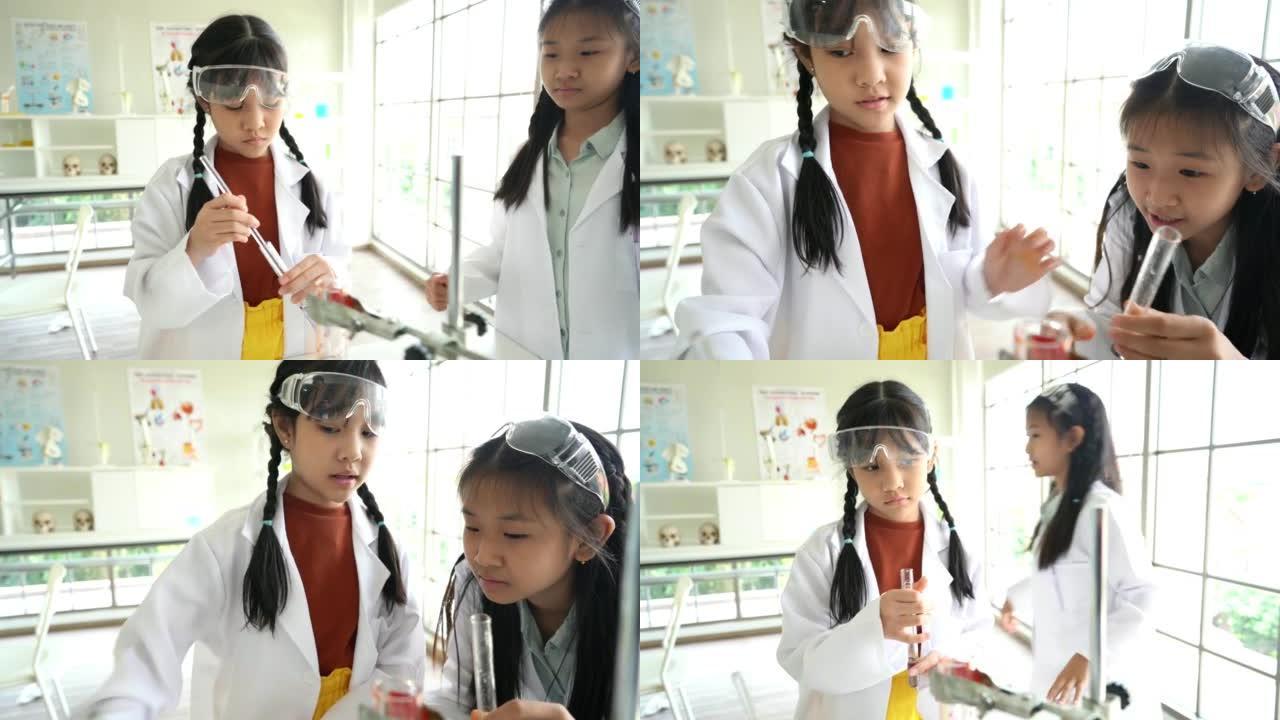 童年的学生和朋友在教室实验室学习科学，走进教室。