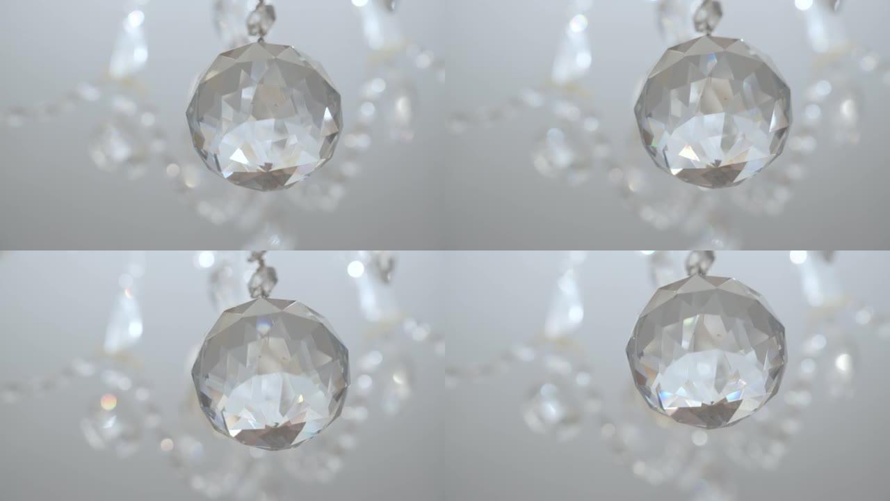水晶球，吊灯装饰。一个玻璃多边形球的特写镜头。