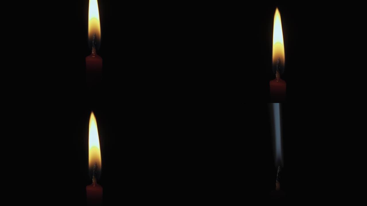 黑色背景上的红色蜡烛，在运动中，滑块拍摄，熄灭蜡烛，蜡烛冒烟，特写镜头。