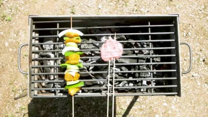 在户外烧烤上制作鸡肉串