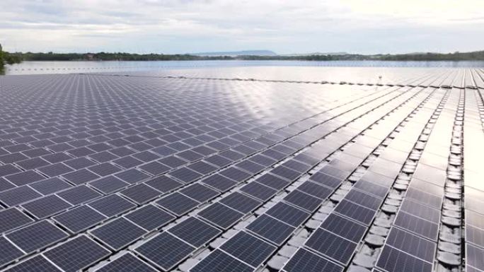 带有太阳能电池的浮动太阳能电池发电厂在湖上发电，航拍视频