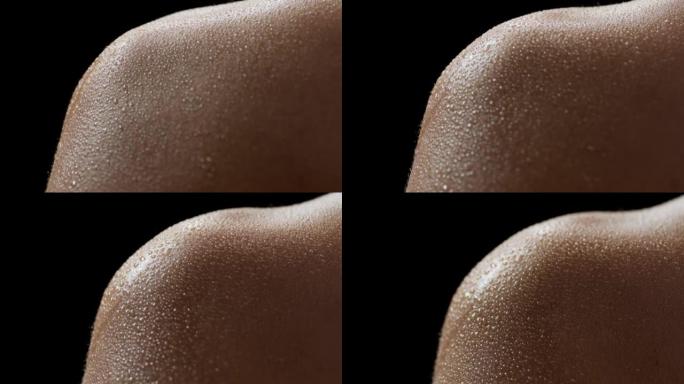 非裔美国女模特湿动皮肤的宏观拍摄
