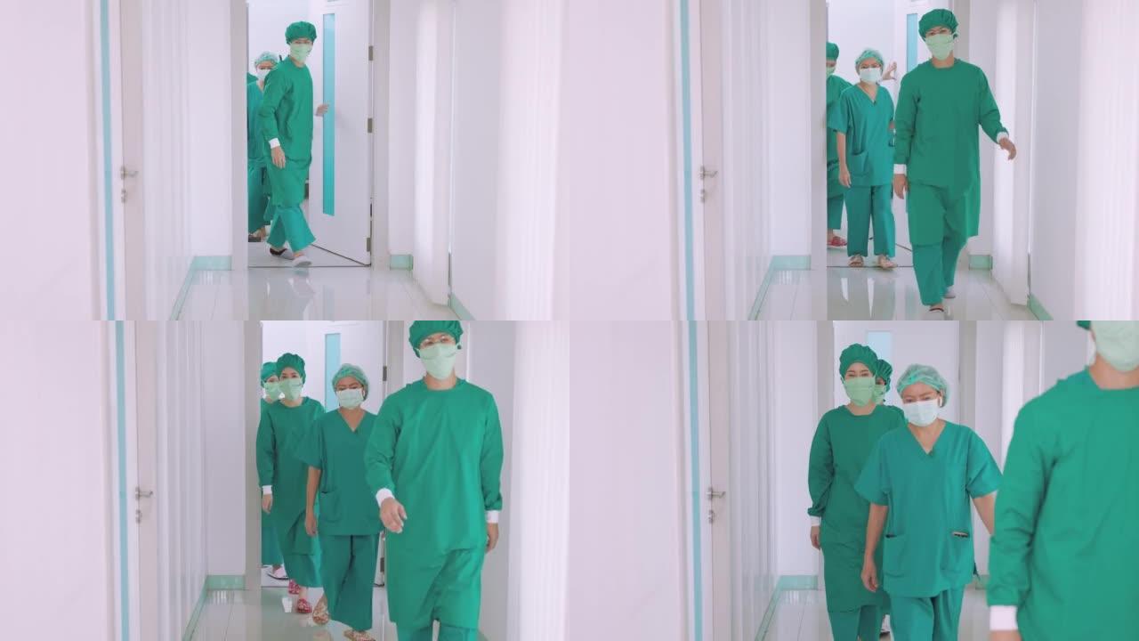 外科医生在手术结束后走出手术室时边走边说。医疗概念和保健治疗