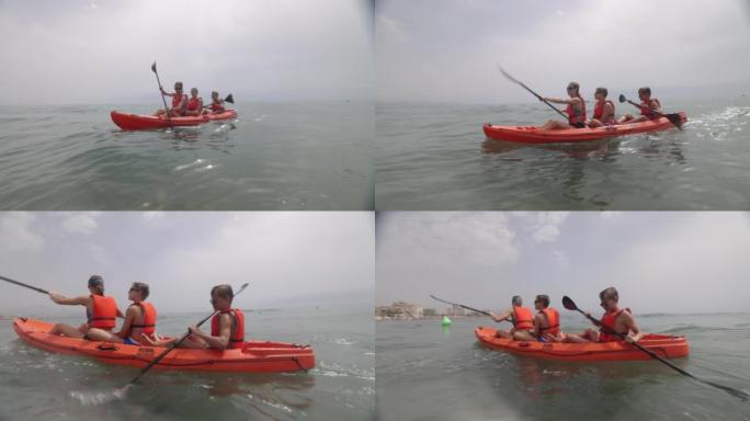 青少年在夏日享受海上皮划艇