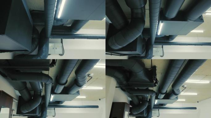 空调位于办公空间的天花板上。房间气候控制系统。