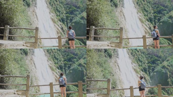 一名女子站在墨西哥恰帕斯的奇弗隆瀑布附近