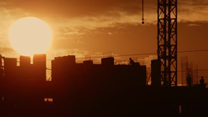 日落时天空太阳背景下的建筑