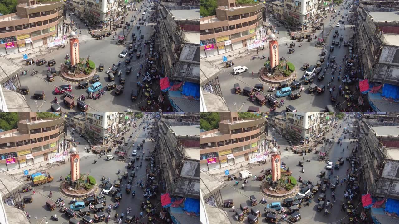 孟买历史地标Shivaji Chowk Circle市场外的高峰时间交通。