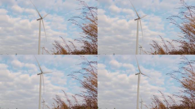 蓝天下的旋转风力发电机，风力发电技术
