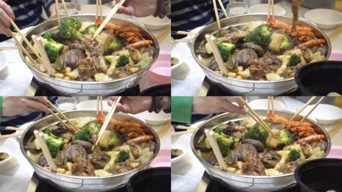 香港家庭在农历新年吃广东盆菜