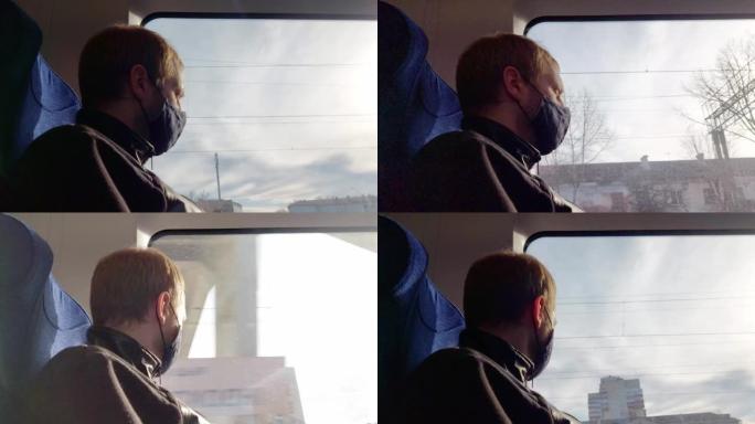 一个戴着黑色面具的男人坐在火车上，看着窗外。旅行时预防感染和疾病。为文本复制空间