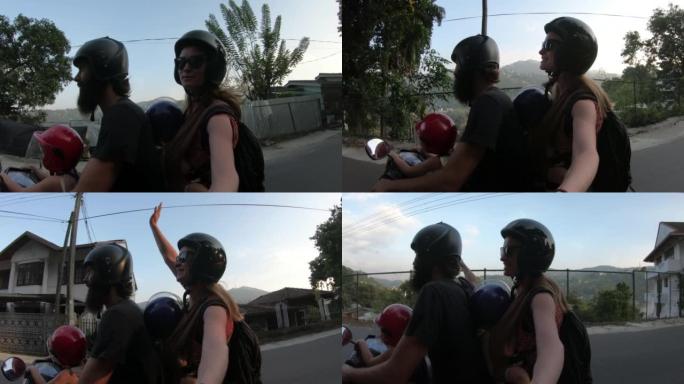 快乐的高加索家庭骑摩托车动作摄像机镜头