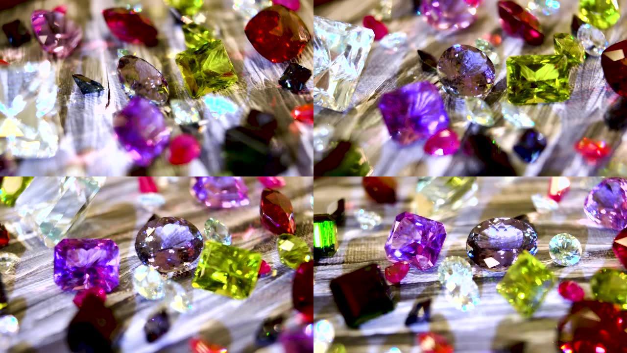 特写。各种宝石和矿物宝石: 红宝石，钻石，祖母绿，玛瑙，紫水晶，蓝宝石，黄玉，电气石，海蓝宝石