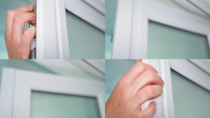 塑料门第二扇的锁定机构。手动解锁并阻挡额外的侧门特写。塑料白色门的配件和锁