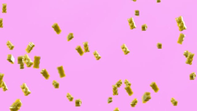 慢动作。无缝循环背景。小熊软糖糖果。黄色果冻糖果熊落在紫色背景上。软糖熊4K，超高清分辨率素材