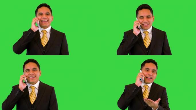 微笑着兴奋的商人西班牙裔打电话成功的老板在绿色屏幕上讲话，颜色键