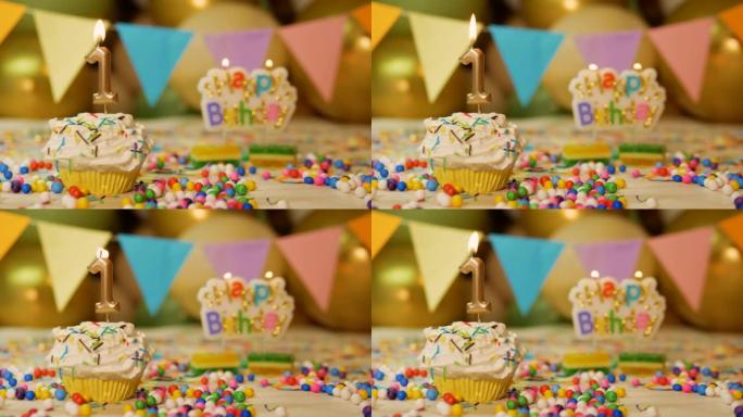 令人难以置信的美丽1岁孩子的生日背景，奶油纸杯蛋糕与燃烧的蜡烛，烟火和气球的背景。1岁宝宝生日背景视