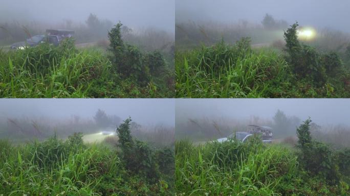 汽车在雨雾中行驶早晨穿过乡村