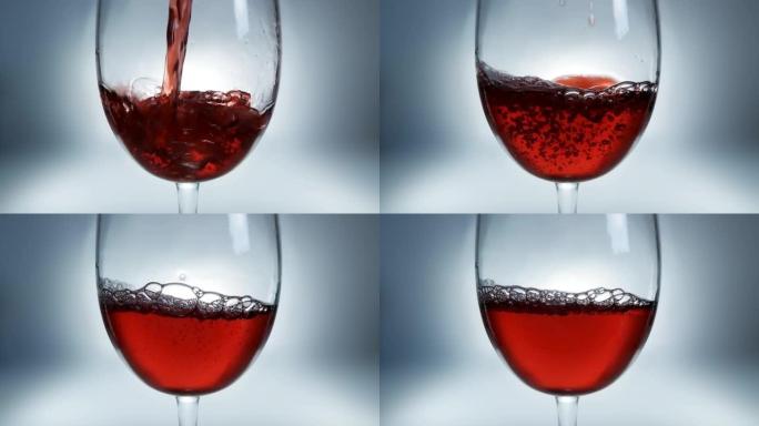 创意微距慢动作4k视频红酒倒入玻璃杯。玻璃杯与倒红酒特写。在高速电影摄像机上拍摄。