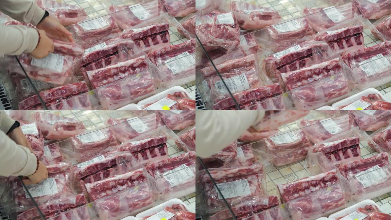 女人在商店购买包装的猪腰肉的特写镜头