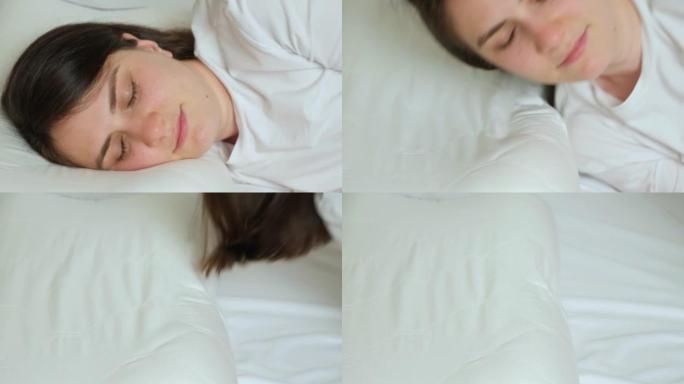 一个女人用记忆泡沫制成的矫形枕头起床，枕头呈以前的形状
