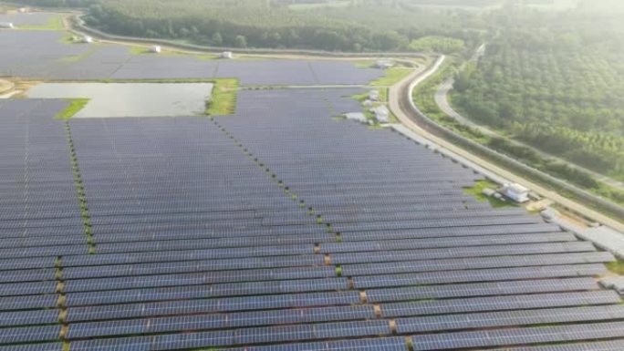太阳能电池板农场的鸟瞰图。光伏板系统。无人机飞行在一块太阳能电池板上飞行。替代能源。