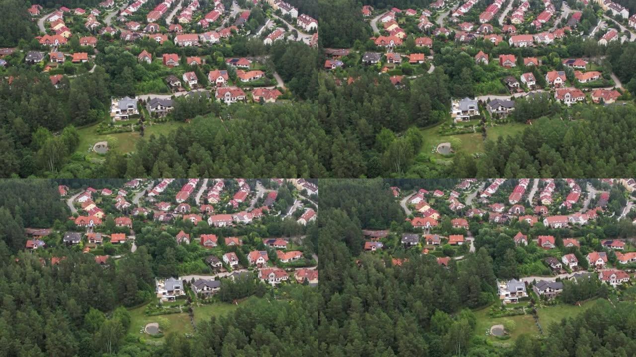 郊区居民区的航拍。郊区住宅的鸟瞰图拍摄。美丽的欧洲乡村地块，有波兰的房子。房地产投资业务