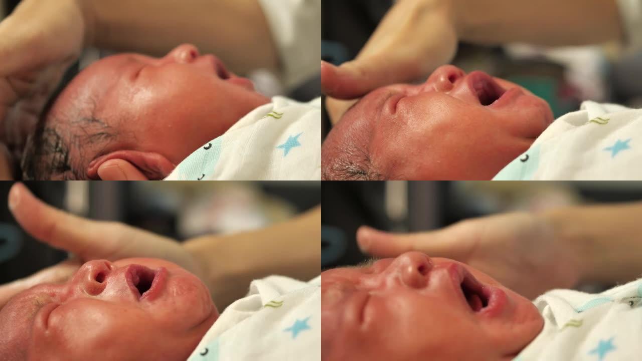 哭泣的新生婴儿的特写镜头