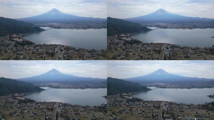 与富士山的川口城市景观的空中后退