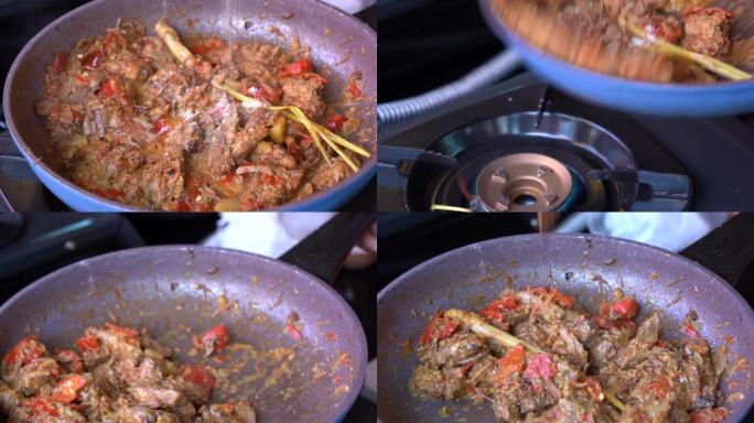 煎锅配洋葱、柠檬草、红辣椒和牛肉，特写镜头。印度尼西亚