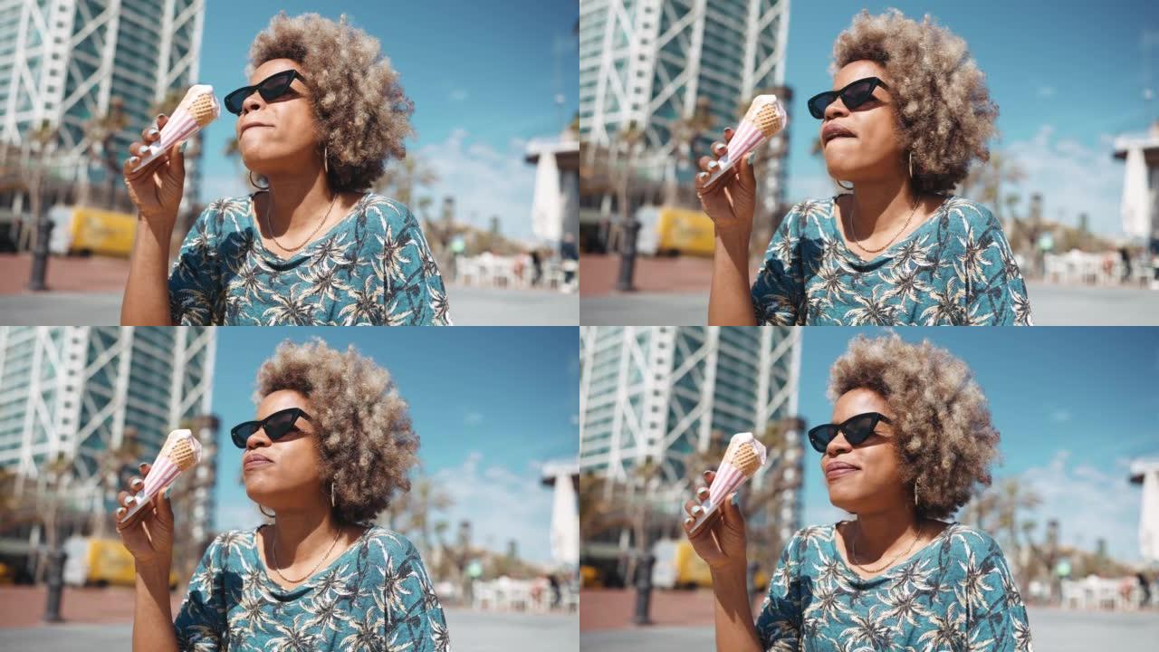 快乐的非洲白发女人吃冰淇淋