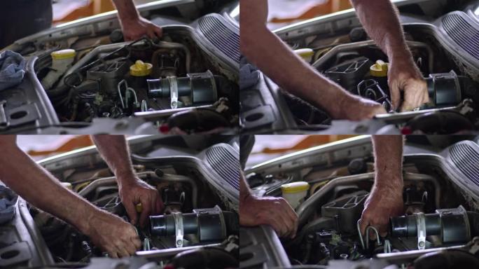 汽车修理工修理有故障的车辆的燃油系统管道