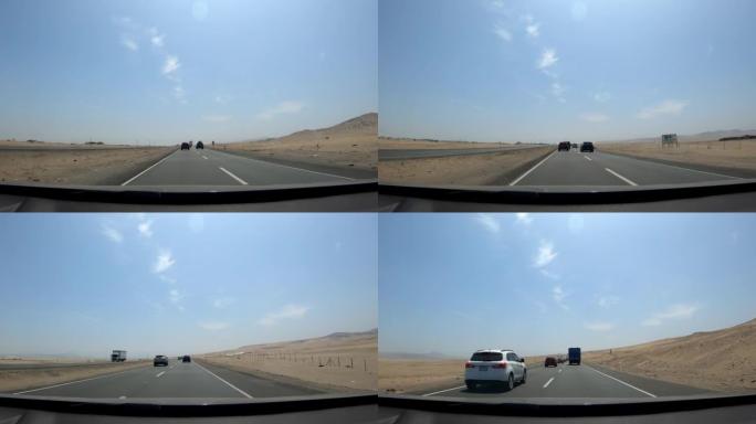白天，视点延时摄像机沿着无尽的沙漠高速公路行驶