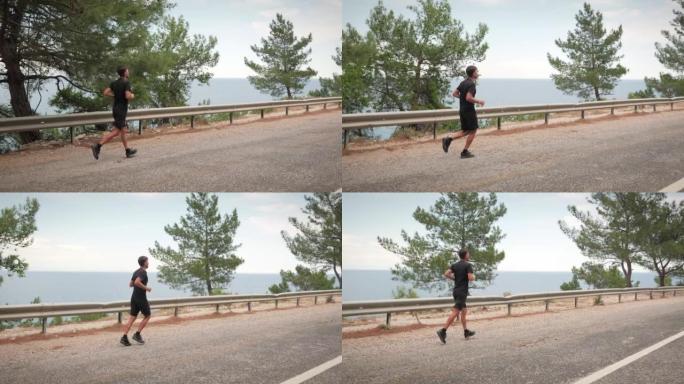 运动员跑步。适合在公路上锻炼的男铁人三项运动员。活跃的运动员晨跑。男性跑步者慢跑。健身动机。耐力跑步