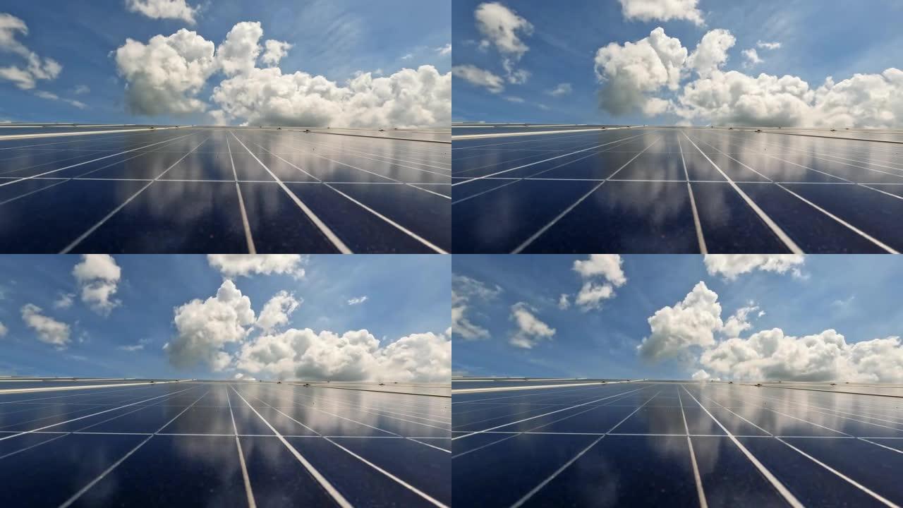 特写光伏太阳能电池与美丽的天空，替代能源概念。