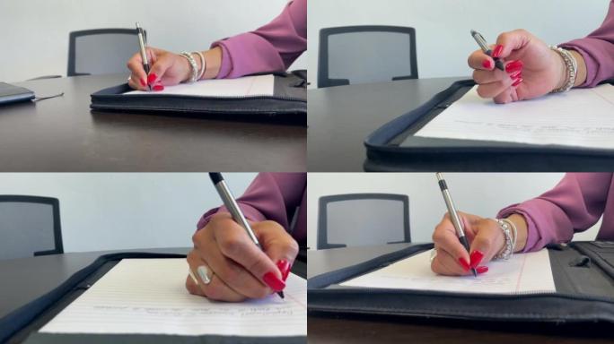 西班牙裔女商人在公司办公室商务工作者特写4k视频系列的法律垫子上写作