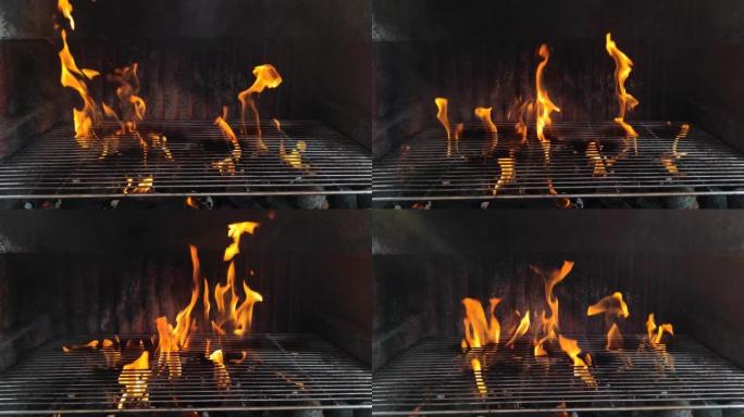 壁炉烧烤炉被放火烧火，并通过烤架板产生大火焰